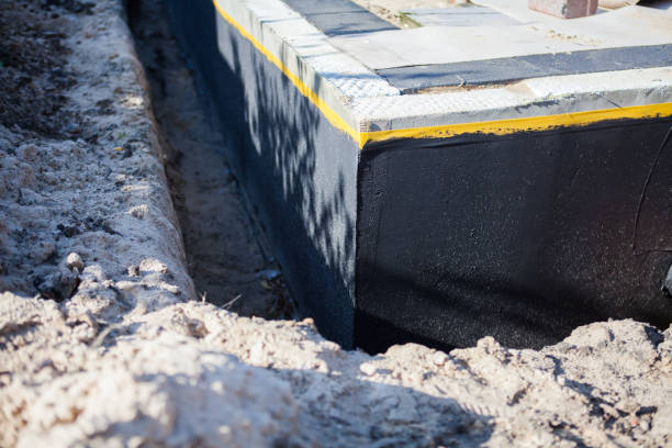 Professional Waterproofing technician working in Merrillville, IN